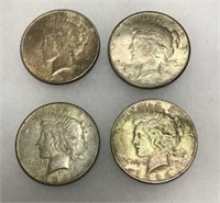 Peace Silver Dollars (4 total)