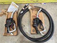 2 Husky fuel nozzles and fuel hose