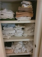 CLOSET FULL OF TOWELS, SHEETS, ETC.