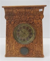 Ornate wood shelf clock. Measures: 14 3/4" H x 12
