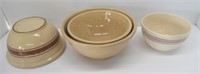 (4) Large stoneware bowls. Largest measures: 6.5"