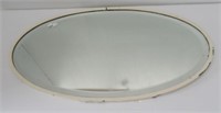 Antique beveled mirror. Measures: 30" H x 16 3/4"