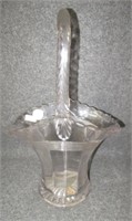 Clear glass basket. Measures: 12" Tall.