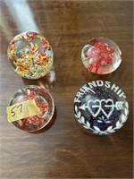 4 early glass paperweights