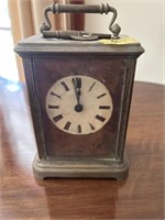 Early brass carriage clock with key