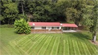 Home & 1.86+- Acres • Barn • Covered Porch