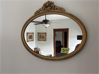 Oval mirror ornate flowers