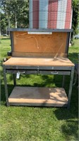 Metal and wood gardening bench with two drawers,