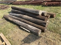 12- Creosote Wood Posts, One Lot, One Money