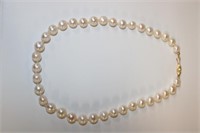 14k yellow gold Pearl Necklace featuring