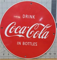 Coca-Cola enamelware round sign