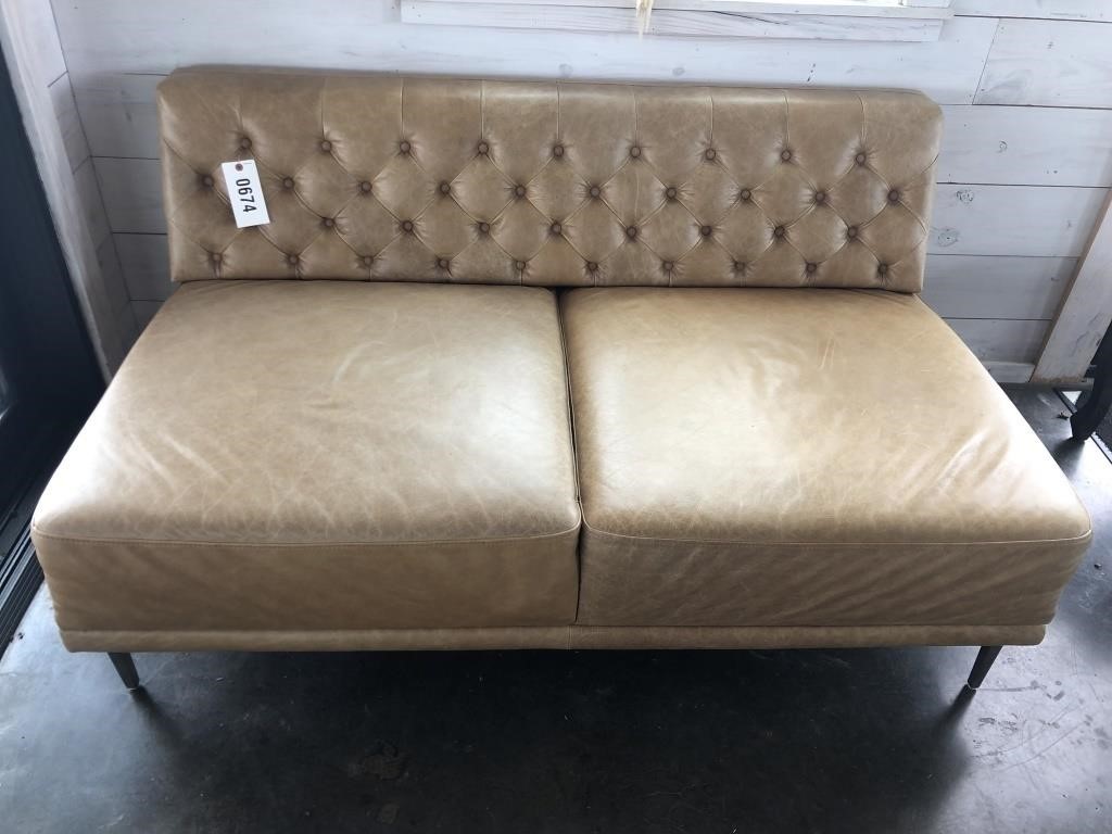 Tufted back armless leather loveseat