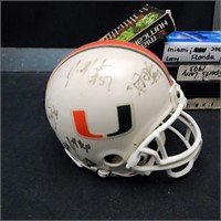 Signed Mini Helment with Footbal and Game Tapes