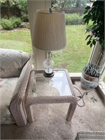Wicker glass top table and lamp