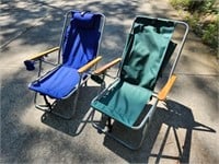 Two folding beach chairs