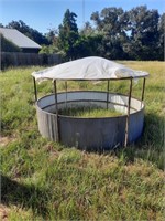 Hay ring with cover