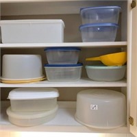 Tupperware & misc. plastics in cabinet