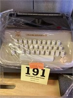 Young Students type writer