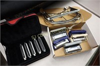 1 Box of multiple harmonicas with 3 neck holders
