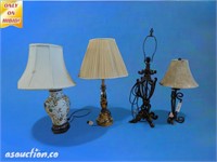 four table lamps, one brass one with olive motifd