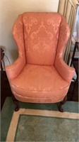Sherrill coral pink wing back chair, carved clam