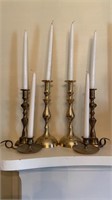 3 pair of brass candlesticks , tallest 12 inches
