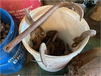 Bucket of large hooks