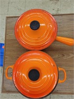 Le Creuset pots with lids