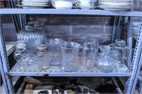 Shelf with Multiple Sized Jars, Vases and