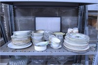 Shelf with Miscellaneous Plates and Tea Cups