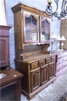Hutch with two glass shelves 4 small drawers and 3