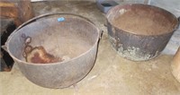 2 cast iron kettles, both damaged