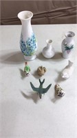 Ceramic bird figurines, vases