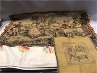THREE VINTAGE CLOTHS WITH DIFFERENT DESIGNS.