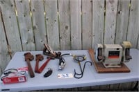 planes, pipe wrenches, hammers, bench grinder