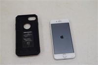 Apple iPhone w/ Case (powers on)