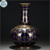 A Chinese Blue Ground And Gilt Bottle Vase