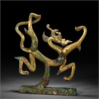 A Chinese Bronze-Gilt Mythical Beast