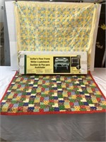 2 HOMEMADE BABY QUILTS AND QUILT RACK