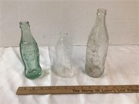 2 COCA-COLA BOTTLES WITH 1 PYREX BOTTLE