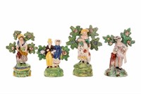 FOUR STAFFORDSHIRE POTTERY BOCAGE FIGURES