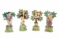FOUR STAFFORDSHIRE POTTERY BOCAGE FIGURES
