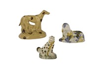 THREE WHIELDON TYPE STAFFORDSHIRE POTTERY DOGS