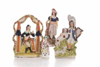 FOUR STAFFORDSHIRE POTTERY FIGURES