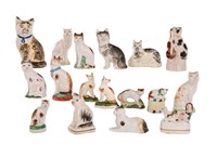 GROUP OF POTTERY CAT FIGURES