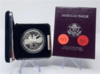 1989 Silver Eagle Proof; 2004 Lewis/Clark Dollar
