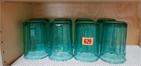 Green glass tumblers (8)