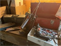Tool boxes with caulk guns & more