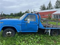 Blue F350 Flat bed ford
