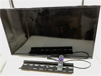 TCL ROKU TV WITH WALL MOUNT AND REMOTE